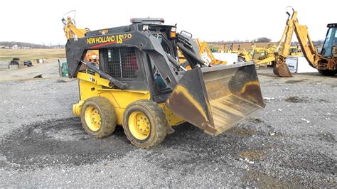 l170 new holland skid steer|new holland ls170 cab tilting.